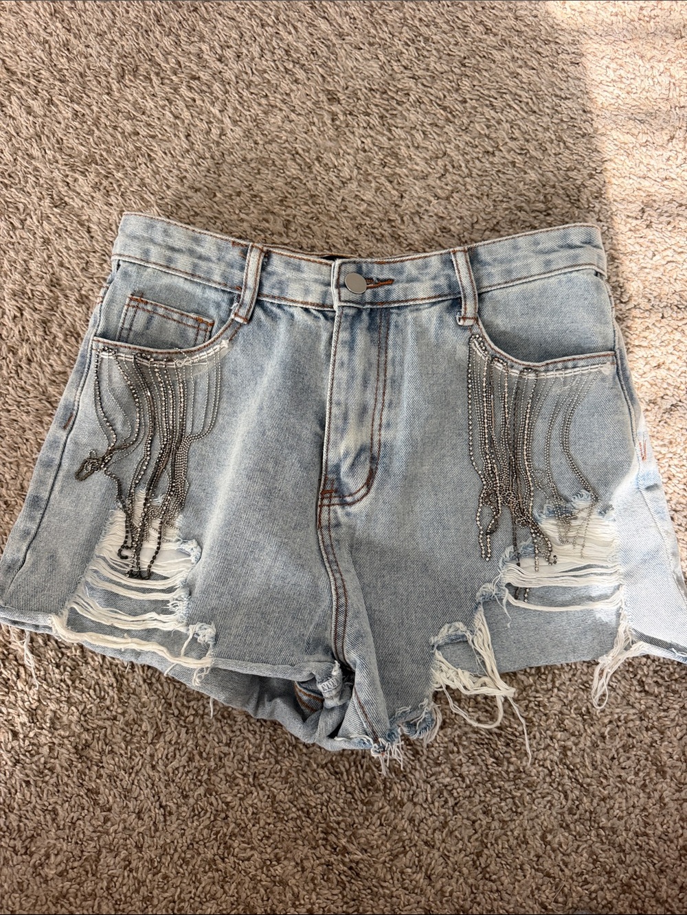 High-Rise Light Blue Distressed Denim Shorts with Chain Fringe